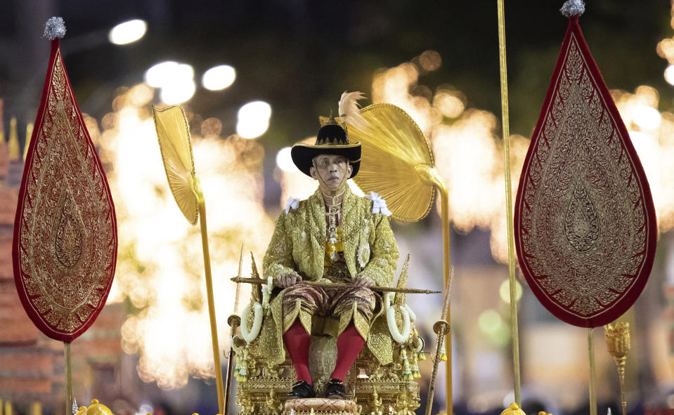 Thailand’s King Maha Vajiralongkorn is carried on a palanquin through the streets outside the Grand Palace for the public to pay homage during the second day of his coronation ceremony in Bangkok, Sunday, May 5, 2019. Vajiralongkorn was officially crowned Saturday amid the splendor of the country’s Grand Palace, taking the central role in an elaborate centuries-old royal ceremony that was last held almost seven decades ago. (AP Photo/Wason Wanichorn)