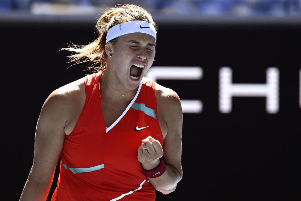 Aryna Sabalenka of Belarus reacts during her third round match against Marketa Vondrousova of the Czech Republic at the Australian Open tennis championships in Melbourne, Australia, Saturday, Jan. 22, 2022. (AP Photo/Andy Brownbill)