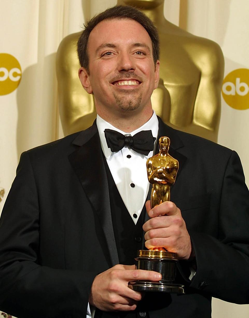 HOLLYWOOD, UNITED STATES: Best Animated Short Film director Ralph Eggleston poses backstage at the 74th Annual Academy Awards at Kodak Theater in Hollywood, CA 24 March 2002. Eggleston won for "For the Birds". AFP PHOTO/Lee CELANO (Photo credit should read LEE CELANO/AFP via Getty Images)