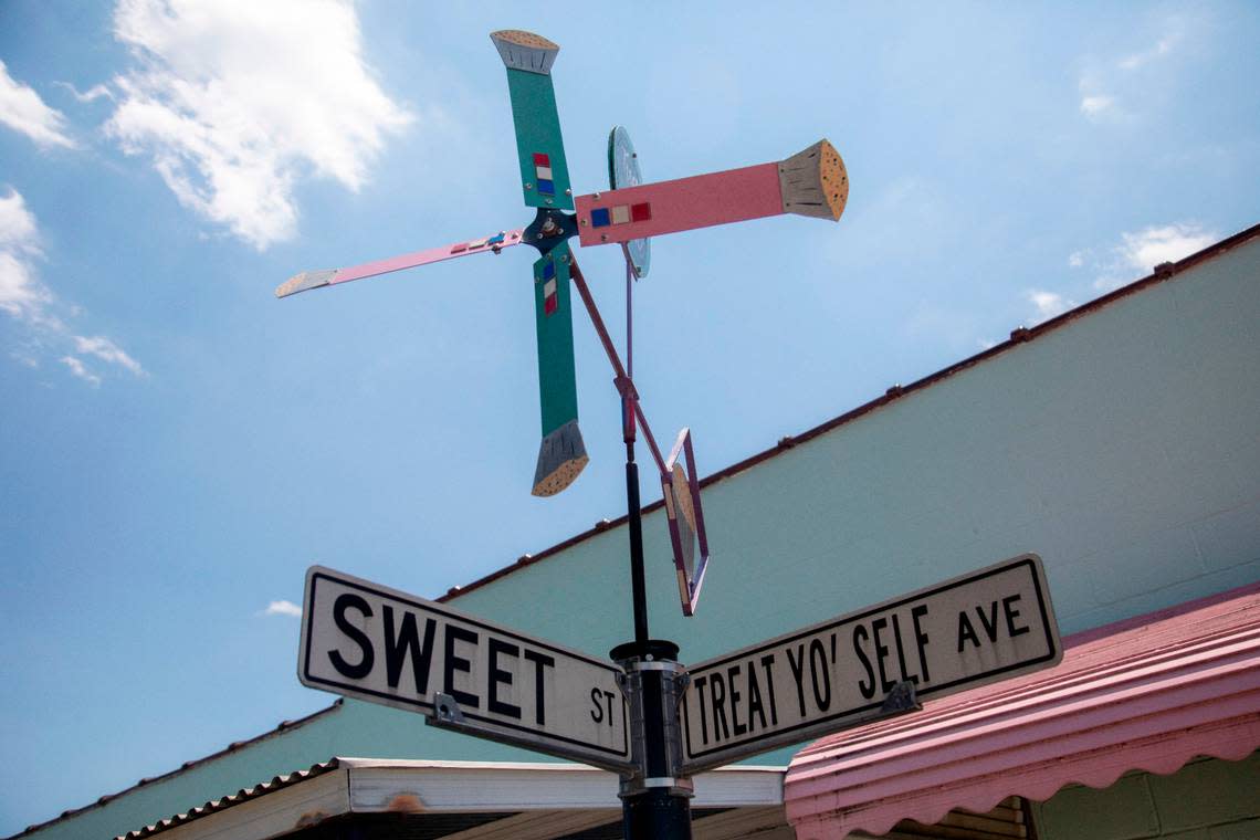 A whirligig greets customers at the entrance of Treat Yo’ Self bakery in Wilson. Owner Greg Mason has more than 1 million TikTok followers and he and his husband Alex Mason started Wilson Pride.