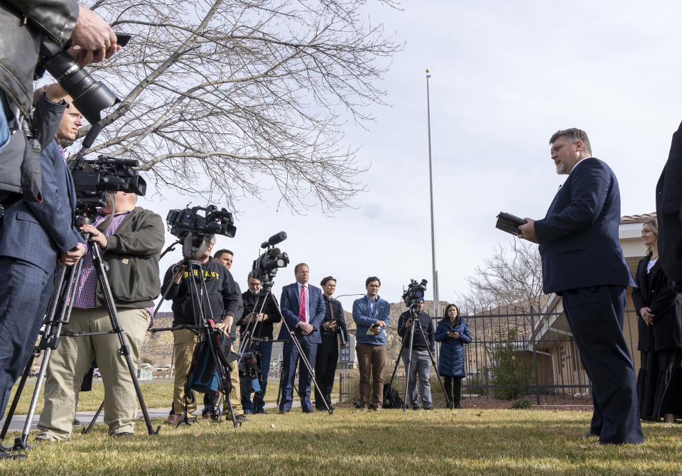 Family member Brett Earl gives a statement to the media after the funeral service for the Haight and Earl families in La Verkin, Utah, on Friday, Jan. 13, 2023, in La Verkin, Utah. Tausha Haight, her mother, Gail Earl, and her five children were shot and killed by her husband Jan. 4. (Rick Egan/The Salt Lake Tribune via AP)