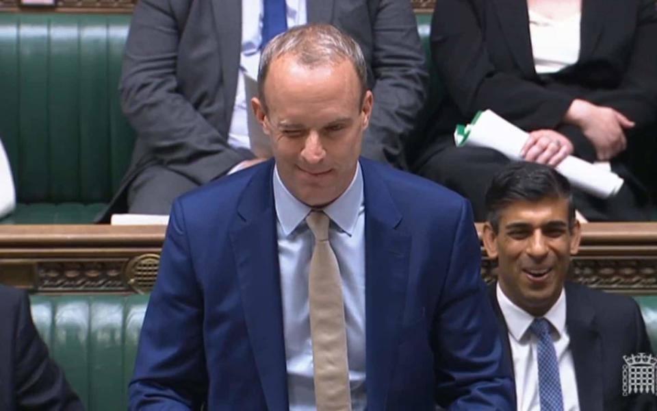 Dominic Raab winks at Deputy Labour Leader Angela Rayner as he speaks during Prime Minister's Questions - PA