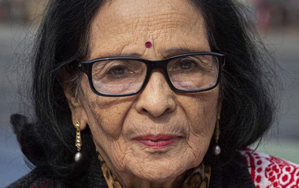 In this Monday, Dec. 23, 2019, photo, Mridula Kakati Hazarika, 78, participates in a protest against the Citizenship Amendment Act in Gauhati, India. Tens of thousands of protesters have taken to India’s streets to call for the revocation of the law, which critics say is the latest effort by Narendra Modi’s government to marginalize the country’s 200 million Muslims. Hazarika said she has come to join the protest as she cannot sit inside her home while the country burns against CAA. (AP Photo/Anupam Nath)