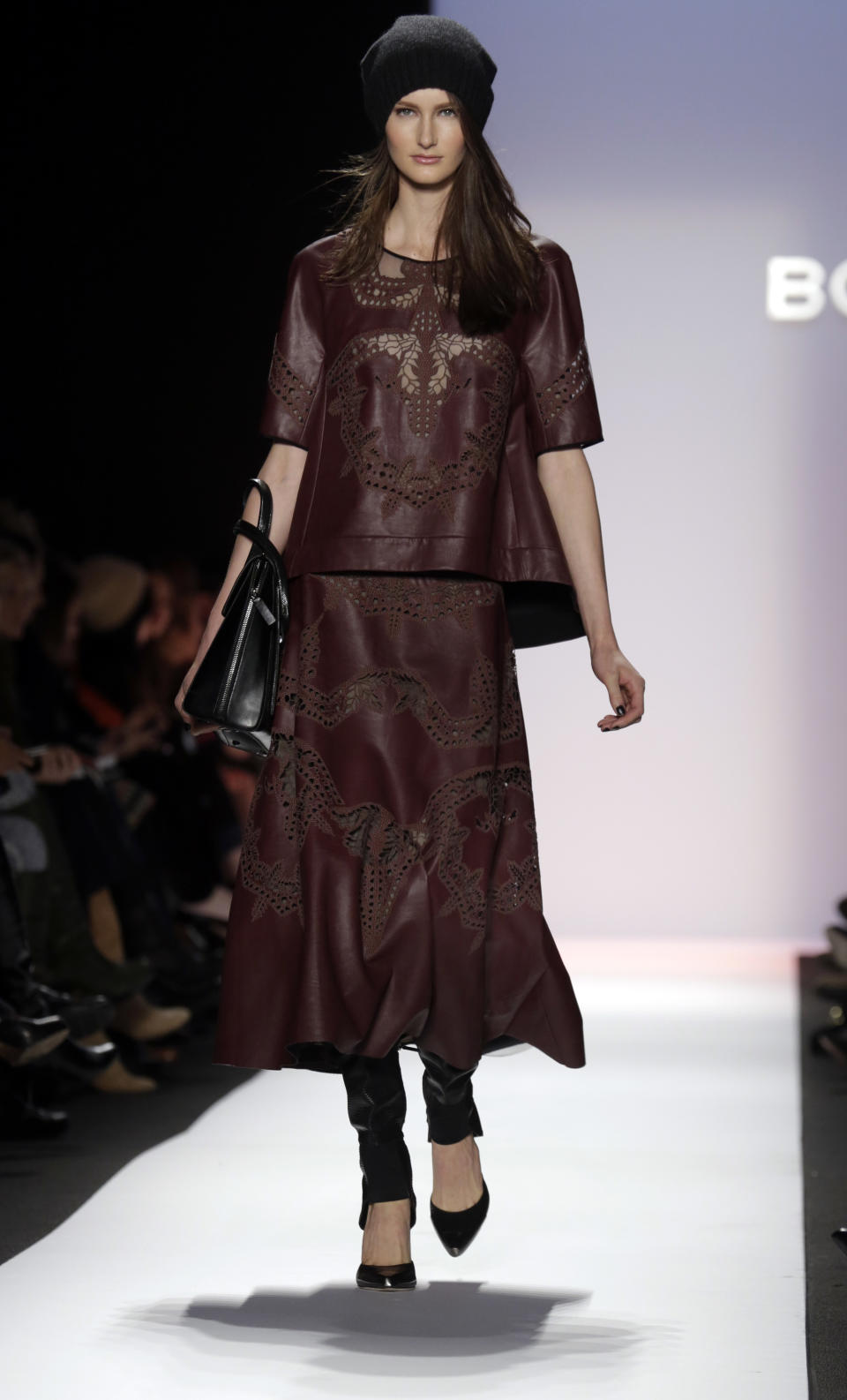 The BCBG Max Azria Fall 2013 collection is modeled during Fashion Week in New York on Thursday, Feb. 7, 2013. (AP Photo/Richard Drew)