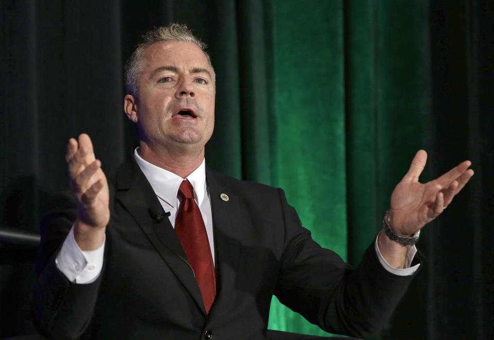 FILE - In this March 8, 2018 file photo is Republican Travis Allen, a former Assemblyman, seen in Sacramento, Calif. Allen is a candidate for the chair of the California Republican Party, which will choose a new leader at it's convention this weekend in Sacramento. Allen is running against Jessica Patterson, who heads a candidate recruitment program and political activist Steve Frank. (AP Photo/Rich Pedroncelli, File)