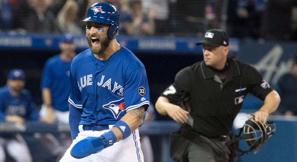 Kevin Pillar reacts after stealing home. (Fred Thornhill/CP)