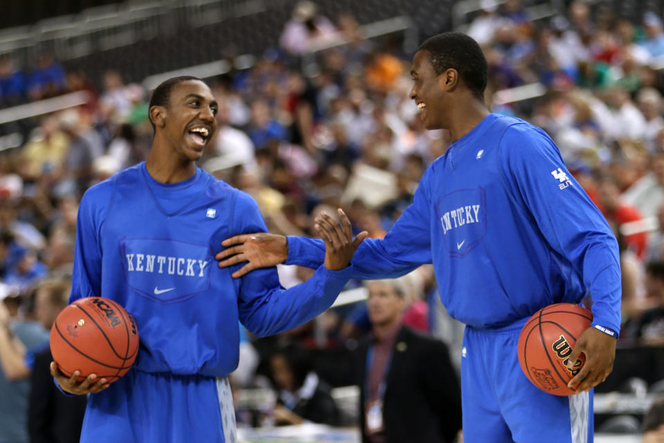 NEW ORLEANS, LA - MARCH 30: Marquis Teague #25 and Doron Lamb #20 of the Kentucky Wildcats talk during practice prior to the 2012 Final Four of the NCAA Division I Men's Basketball Tournament at the Mercedes-Benz Superdome on March 30, 2012 in New Orleans, Louisiana. (Photo by Jeff Gross/Getty Images)