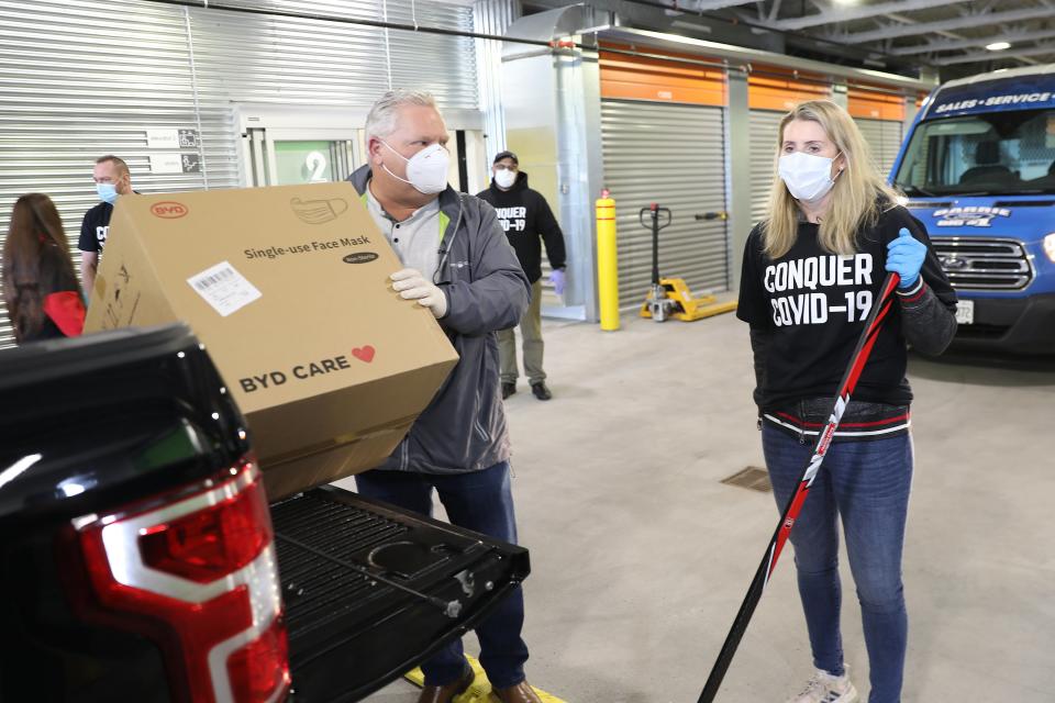 TORONTO, ON - APRIL 11: Premier Doug Ford drops off face masks to Canadian hockey legend Hayley Wickenheiser. Conquer COVID-19, in collaboration with Canadian hockey legend Hayley Wickenheiser and actor Ryan Reynolds, collects masks, gloves, and other supplies that are essential for healthcare workers amid the COVID-19 pandemic.        (Rene Johnston/Toronto Star via Getty Images)