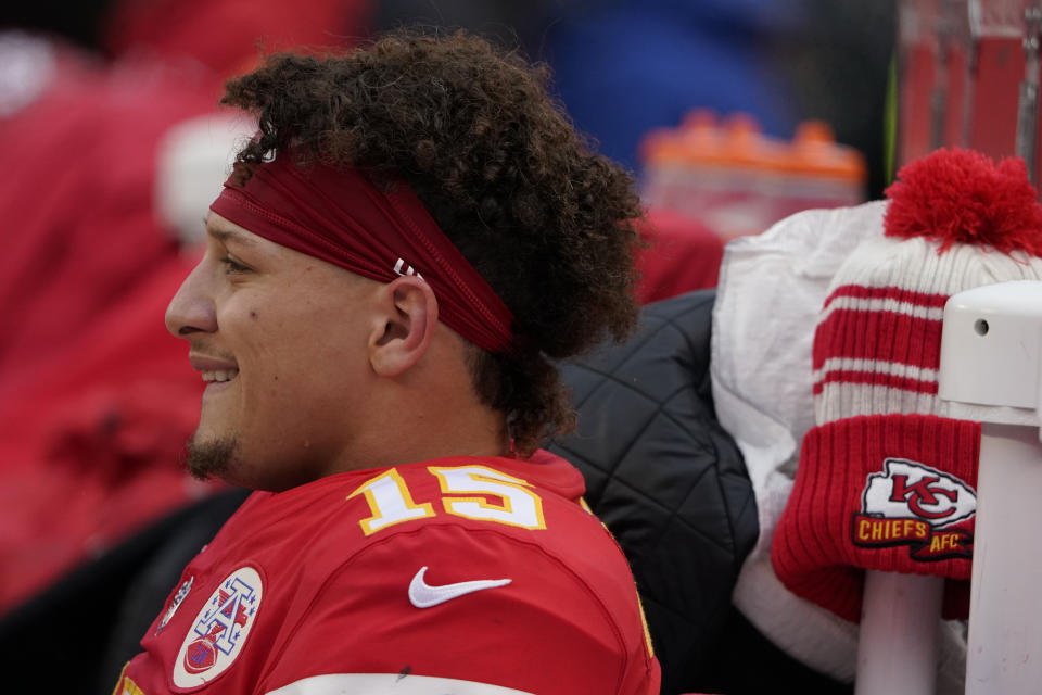 Kansas City Chiefs quarterback Patrick Mahomes (15) sits on the bench during the first half of an NFL divisional round playoff football game between the Kansas City Chiefs and the Jacksonville Jaguars, Saturday, Jan. 21, 2023, in Kansas City, Mo. (AP Photo/Ed Zurga)
