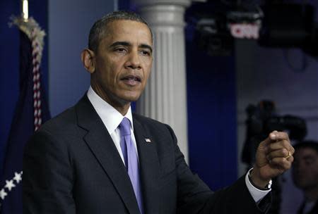 U.S. President Barack Obama speaks to the media in the briefing room of the White House in Washington after the Senate passed the bill to reopen the government, October 16, 2013. REUTERS/Yuri Gripas