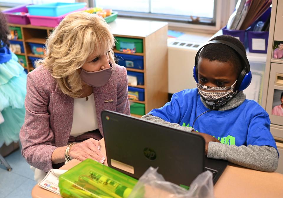 First lady Jill Biden speaks with a student as she tours Benjamin Franklin Elementary School,  March 3, 2021 in Meriden, Ct.