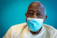 Baseball Hall of Famer Hank Aaron sits for a portrait after receiving his COVID-19 vaccination on Tuesday, Jan. 5, 2021, at the Morehouse School of Medicine in Atlanta. Aaron and others received their vaccinations in an effort to highlight the importance of getting vaccinated for Black Americans who might be hesitant to do so. (AP Photo/Ron Harris)