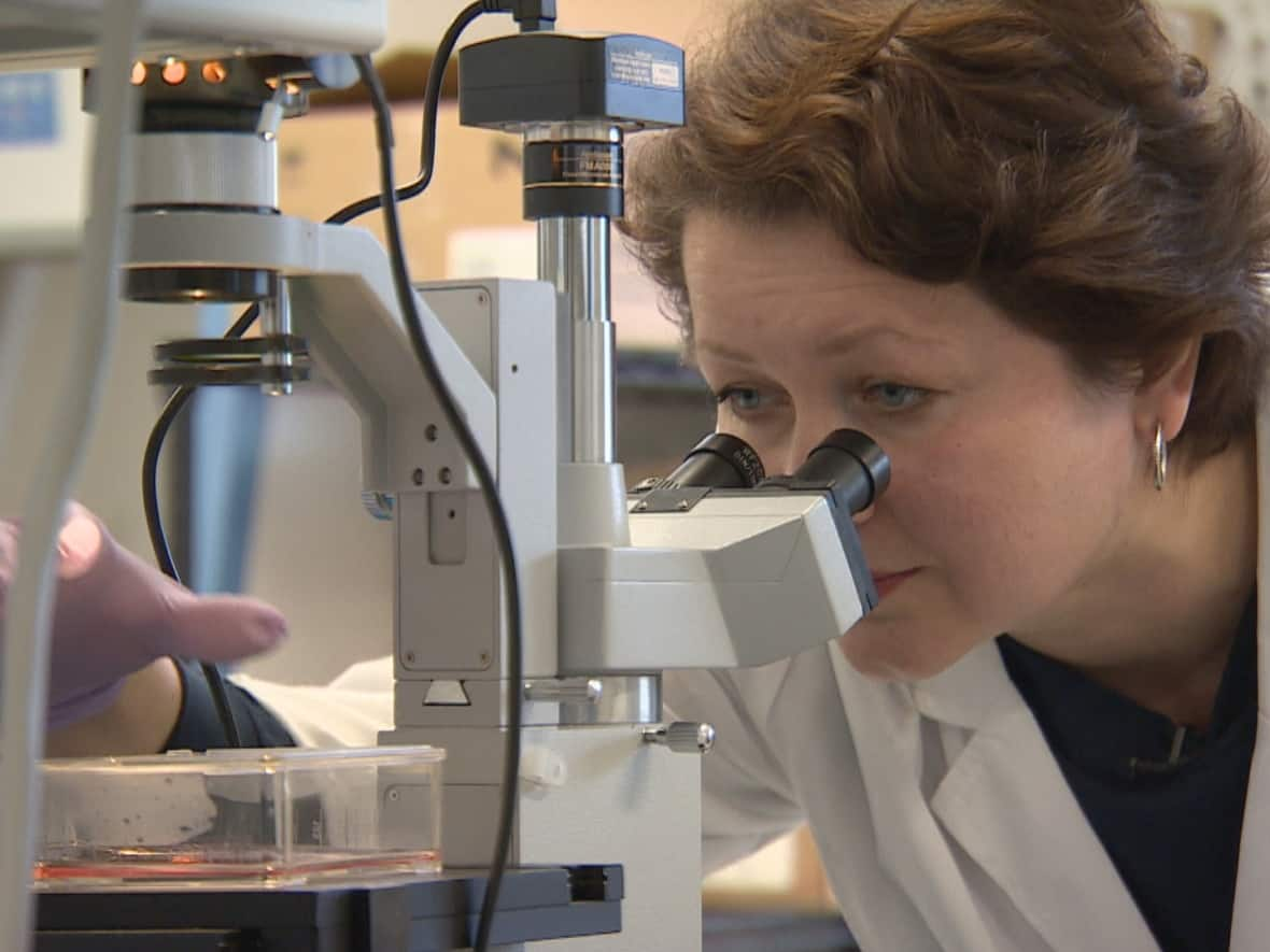 Iryna Ilienko is a cell biologist who recently fled Ukraine. After arriving in Canada, she was hired by Future Fields, a biotechnology company in Edmonton. (Sam Martin/CBC - image credit)