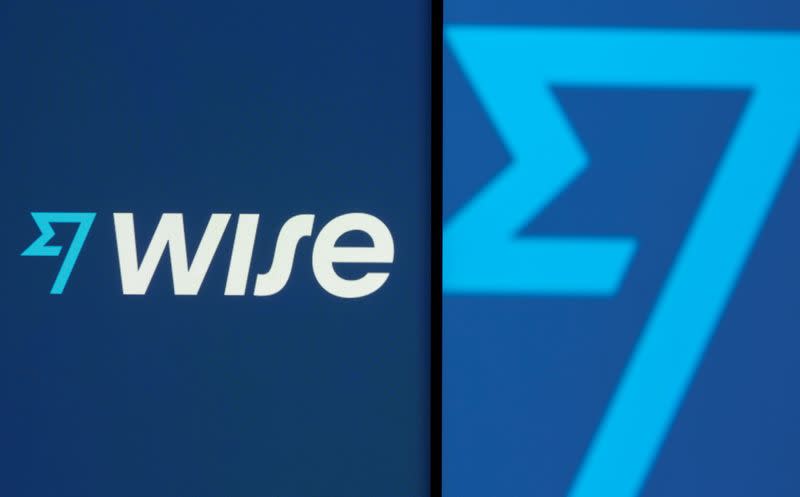 FILE PHOTO: Wise logo is seen on a smartphone in front of a displayed detail of the same logo