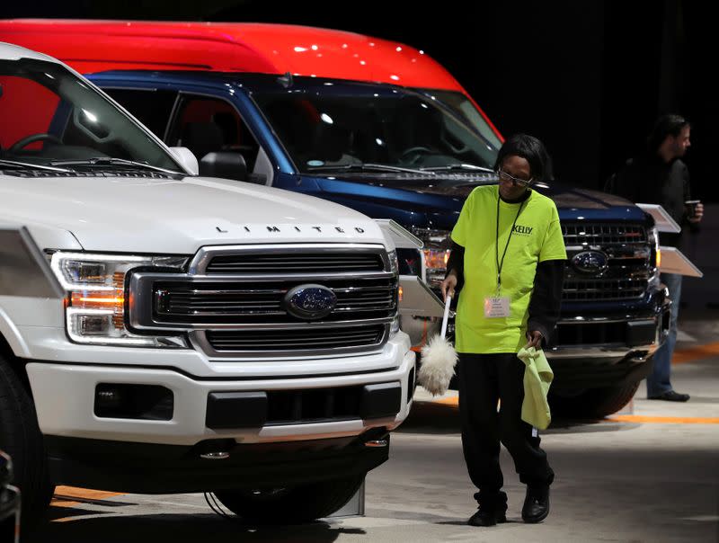 sbFILE PHOTO: Worker cleans Ford pickup truck at the North American International Auto Show in Detroit, Michigan