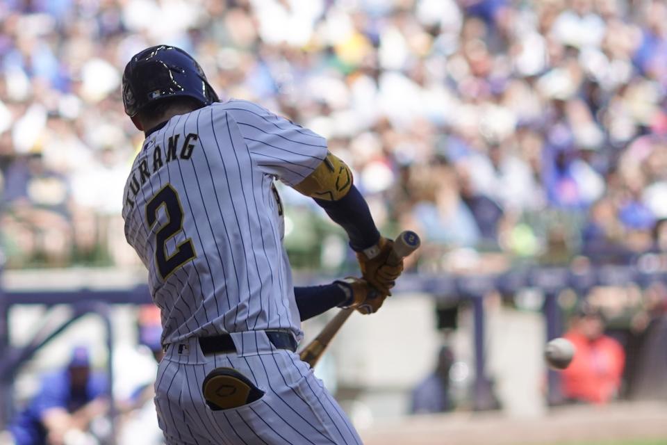 Milwaukee Brewers' Brice Turang hits a grand slam during the fourth inning of a baseball game against the Chicago Cubs Sunday, June 30, 2024, in Milwaukee. (AP Photo/Morry Gash)