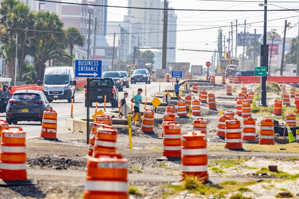 Barrels line Front Beach Road near State 79 on Thursday as work continues on the Panama City Beach redevelopment project.