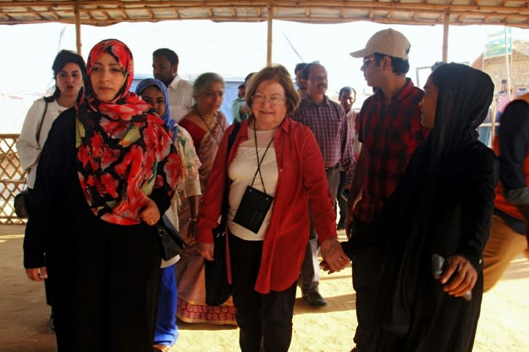 Nobel Peace Laureates Mairead Maguire (C) from Northern Ireland and Tawakkol Karman (L) from Yemen walk during their visit to Kutupalong refugee camp in Ukhia