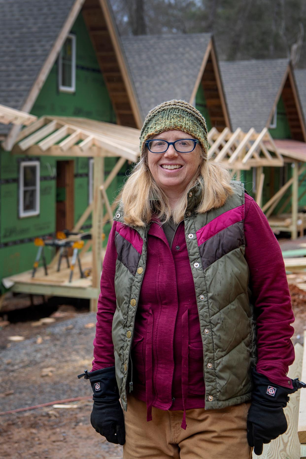 Amy Cantrell, co-director of BeLoved Asheville, at the construction site of the deeply affordable homes at BeLoved Village, January 15, 2024.