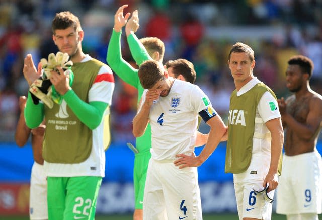 Gerrard, centre, shows his emotions at the end of his last match for England against Costa Rica at the 2014 World Cup