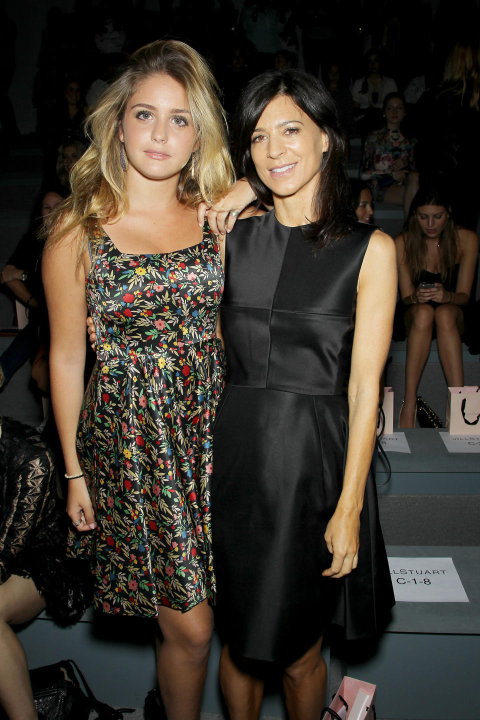 This image released by Starpix shows Sophie Curtis, left, and Perrey Reeves attending the Jill Stuart Spring 2014 show during Fashion Week in New York, Saturday, Sept. 7, 2013. (AP Photo/Starpix, Marion Curtis)