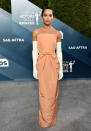 Zoë Kravitz seemed to be channelling old-Hollywood in this simple but elegant peach strapless gown by Oscar de la Renta, complete with full length white gloves. [Photo: Getty]