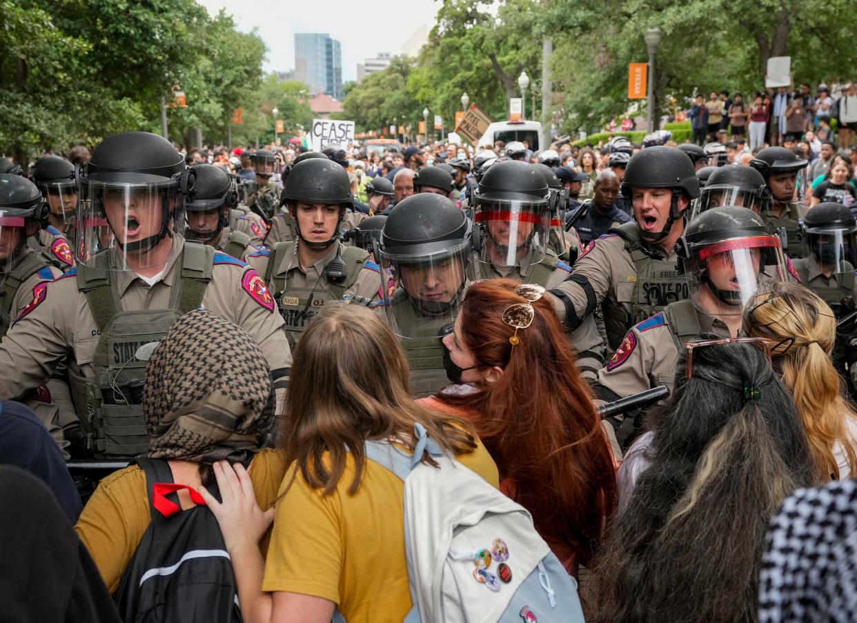 Texas Department of Public Safety troopers clash with pro-Palestinian protesters Wednesday at the University of Texas.
