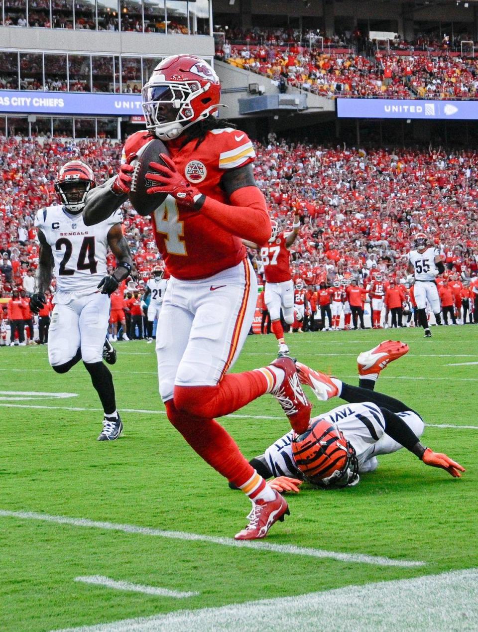 Kansas City Chiefs wide receiver Rashee Rice (4) runs in for a touchdown on a first quarter reception against the Cincinnati Bengals Sunday, Sept. 15, 2024, at GEHA Field at Arrowhead Stadium.