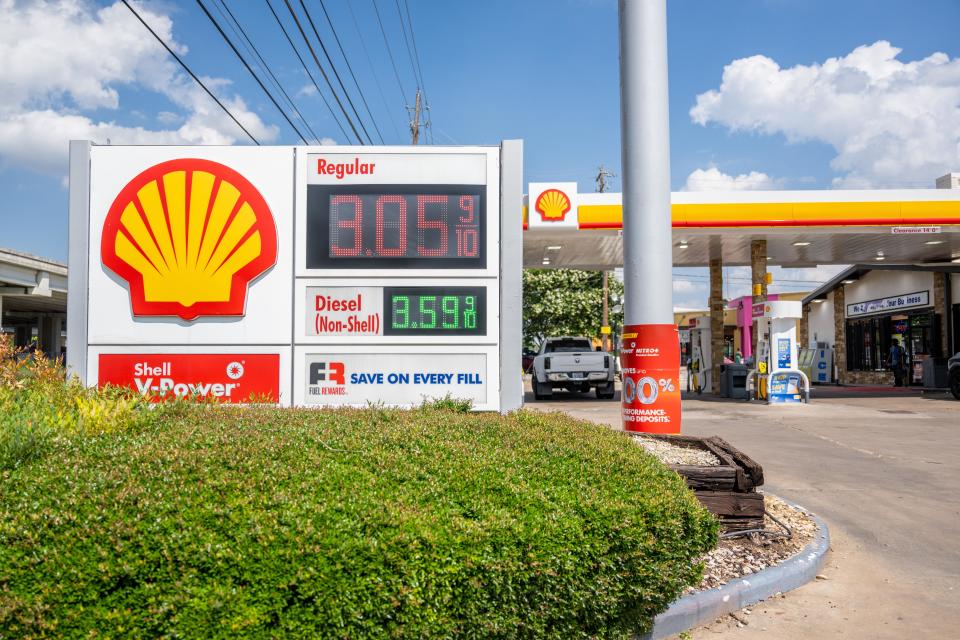 Prices at a Shell station in Austin are seen in May. Russia's war against Ukraine and the easing of the COVID-19 pandemic have had much bigger effects on gasoline costs than President Joe Biden's policies.