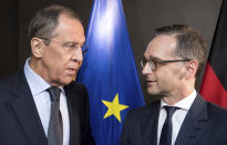 German foreign minister Heiko Maas, right, talks to Russian foreign minister Sergej Lawrow at a bilateral meeting at the Security Conference in Munich, Germany, Friday, Feb. 15, 2019. (Sven Hoppe/dpa via AP)