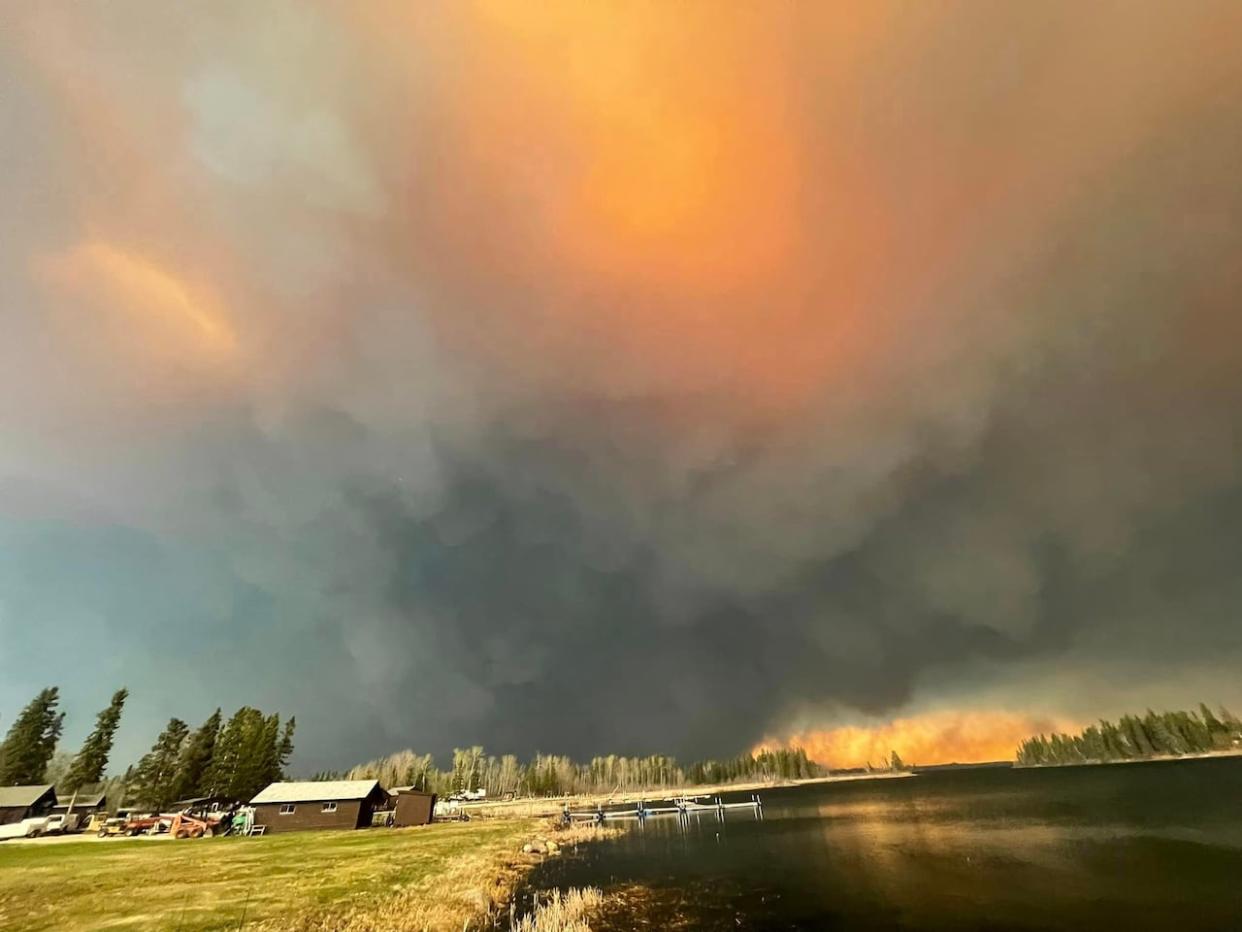 A massive fire is burning in northwestern Manitoba near Flin Flon and Cranberry Portage. (Bailey Anderson/Facebook - image credit)