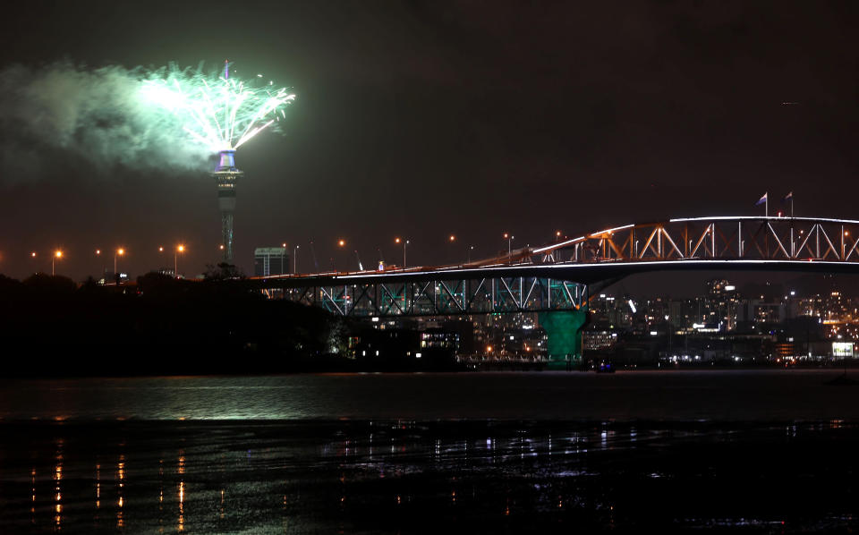 Fireworks explode from Auckland's Sky Tower as the New Year is welcomed in Auckland, New Zealand