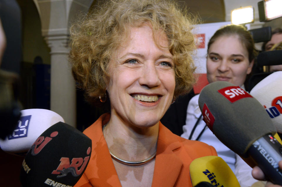 In this Sunday, Feb. 9, 2014 photo, Zurich Mayor Corine Mauch speaks to reporters after her re-election in Zurich. Mauch was born a U.S. citizen, maintaining dual citizenship even after she was elected to Zurich’s city council. But when she became mayor, she reconsidered. During the last American presidential election, "I asked myself 'Where do I feel at home?' And the answer is clear: In Zurich and in Switzerland. My attachment to America is limited to my very early youth." (AP Photo/Keystone, Walter Bieri)