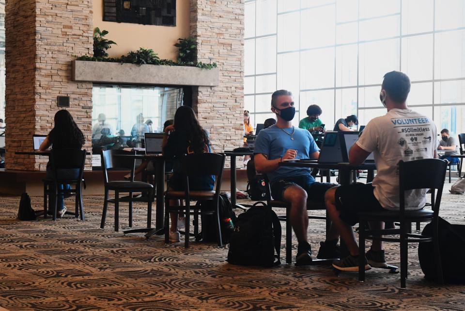 Students study inside of the Student Center on MU’s campus on Aug. 24, the first day of classes.