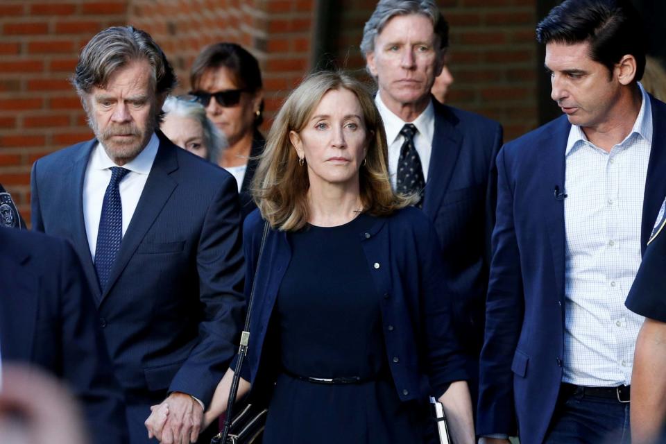 Actress Felicity Huffman leaves the federal courthouse (REUTERS)