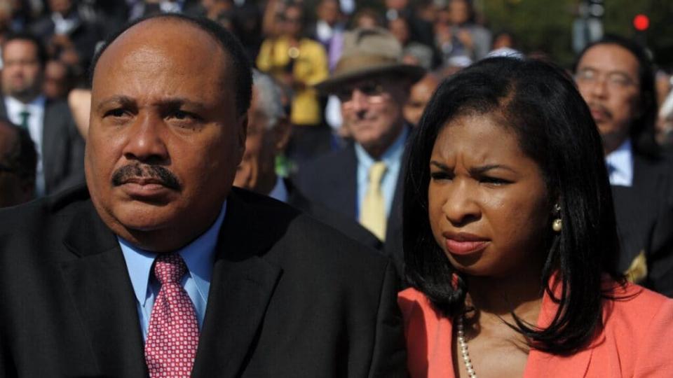 Martin Luther King III, the son of Martin Luther King Jr, and his wife Arndrea Waters King attend the dedication of the Martin Luther King Jr. Memorial October 16, 2011 in Washington, DC. AFP PHOTO/Mandel NGAN (Photo credit should read MANDEL NGAN/AFP via Getty Images)