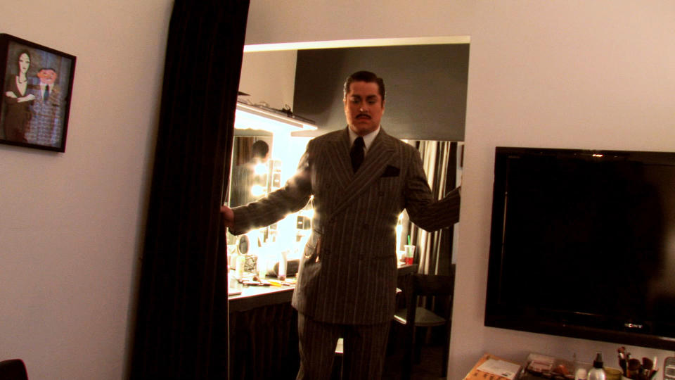 This image released by Sunchaser Entertainment shows actor Merwin Foard dressed as Gomez for "The Addams Family," in a scene from the documentary "The Standbys." Foard is a top standby, an actor hired to wait in the wings of Broadway shows each night, ready in full costume, just in case the star of the show gets injured or sick. (AP Photo/Sunchaser Entertainment)