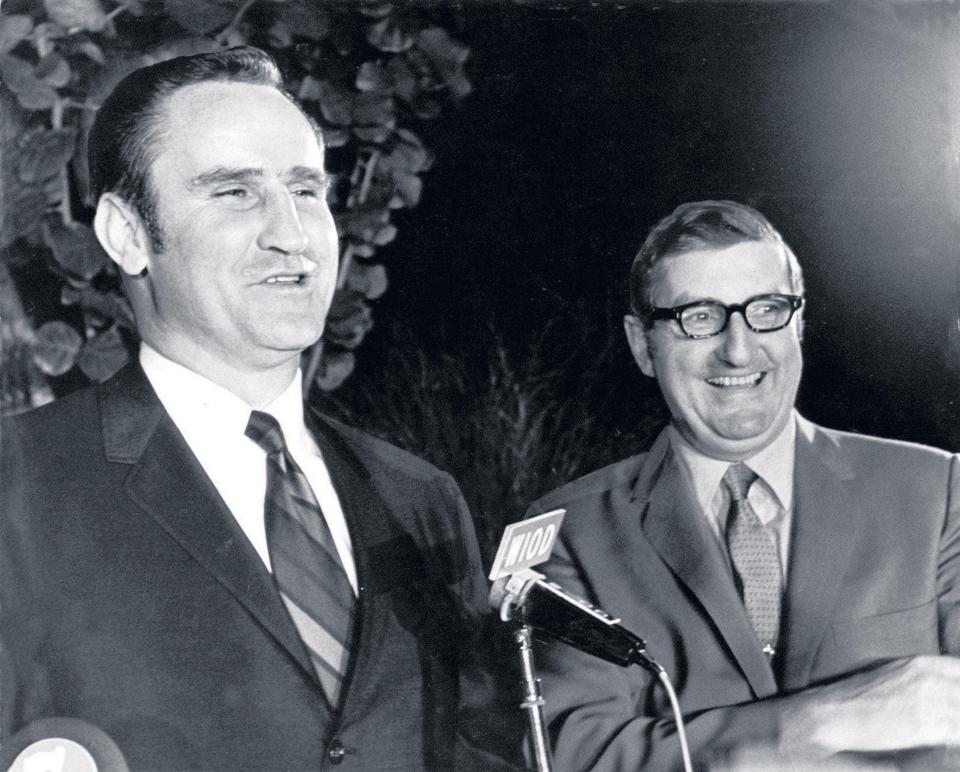 Don Shula, left, is introduced as the Dolphins' coach by owner Joe Robbie in 1970.