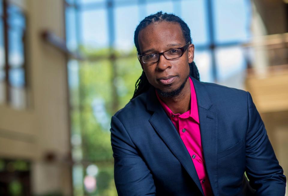 In this undated photo provided by American University, Ibram X. Kendi, author of "Antiracist Baby," poses for a portrait. After a week of riots and looting over the loss of George Floyd, the Minneapolis black man who died after a police officer pressed his knee into his neck for more than eight minutes as he pleaded for air, parents are struggling to have the talk in this volatile moment, along with many others around race and racism.