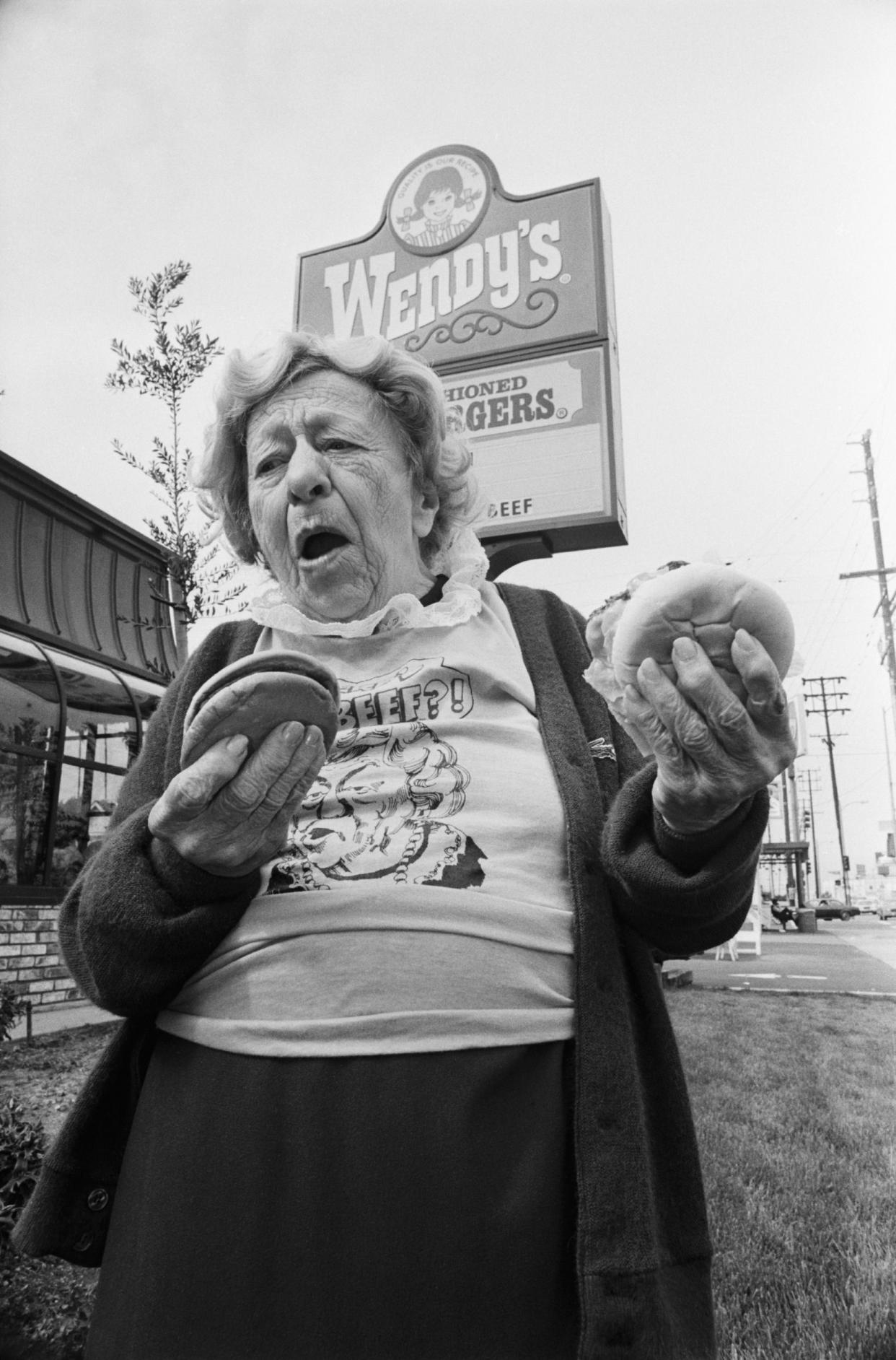 Wendy's 'Where's the Beef' Lady, Clara Peller, Poses With Two Hamburgers in Front of Wendy's, Los Angeles