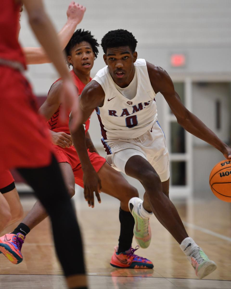 Sarasota (Fla.) Riverview guard Jason Jackson (0) drives to the basket during a Dec. 30 game against Sarasota Cardinal Mooney. Jackson made a non-binding commitment Thursday night to Texas Tech.