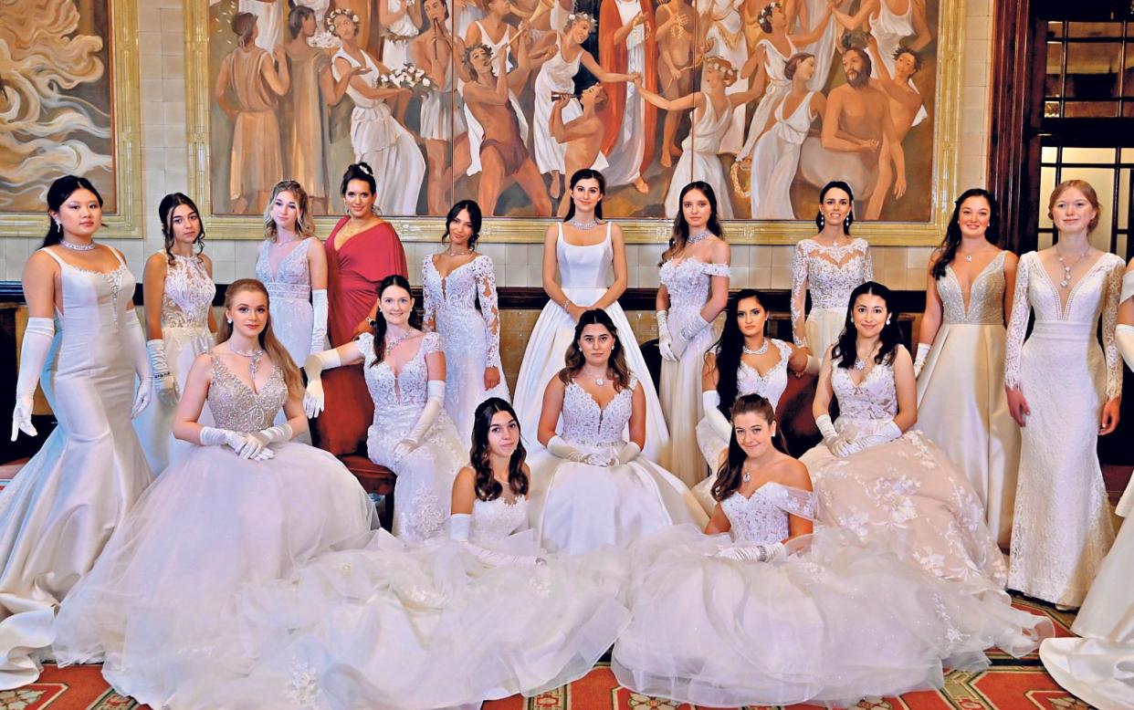 Debutantes attend a recent event at One Whitehall Place - Shutterstock