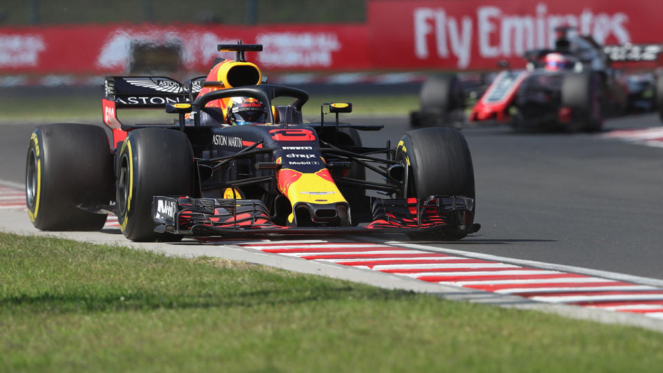 Red Bull’s Australian driver Daniel Ricciardo races during the Formula One Hungarian Grand Prix at the Hungaroring circuit in Mogyorod near Budapest, Hungary, on July 29, 2018. (Photo by FERENC ISZA / AFP) (Photo credit should read FERENC ISZA/AFP/Getty Images)