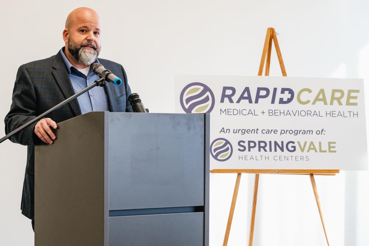 JJ Boroski, executive director of SpringVale Health Centers, speaks during a press conference, Wednesday, at the Tolloty Technology Incubator. SpingVale will discontinue its 24/7 crisis intervention service at the end of the year due to a lack of funding.