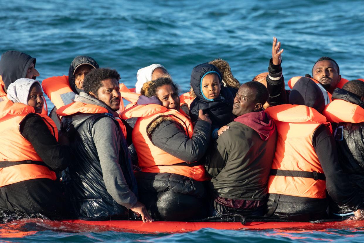 People crossing the English channel on an inflatable boat near Dover (Getty Images)