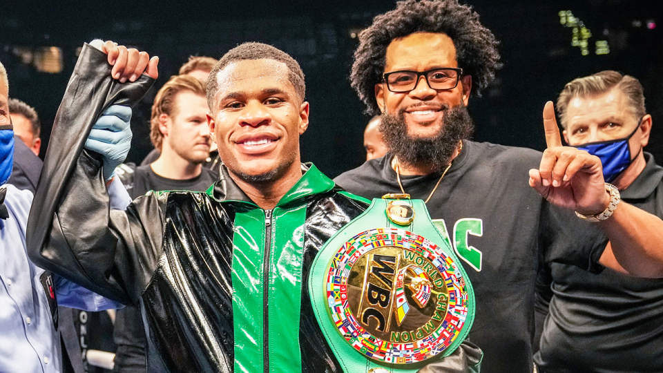 Devin Haney (pictured left) has arrived in Australia ahead of the blockbuster lightweight title fight against George Kombosos Jr. (Getty Images) 