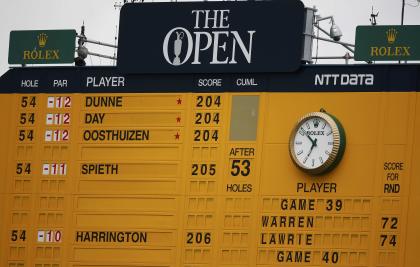 The scoreboard shows Paul Dunne of Ireland at the top. (REUTERS)