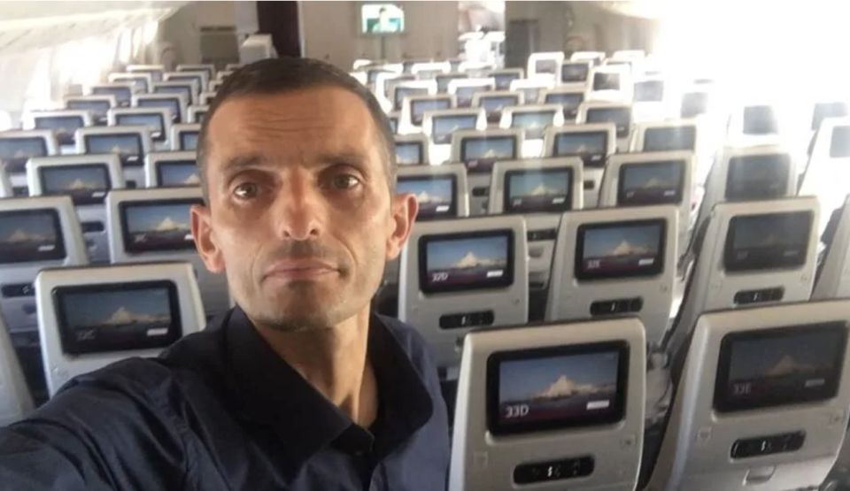 Albion Haxhnikaj takes a selfie on an empty plane.