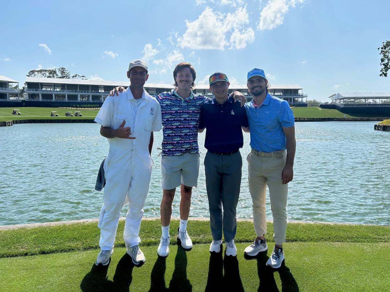 Jayden Valasek (second from right) with their caddie (left), Tom Broders and Matt Scharff (right).