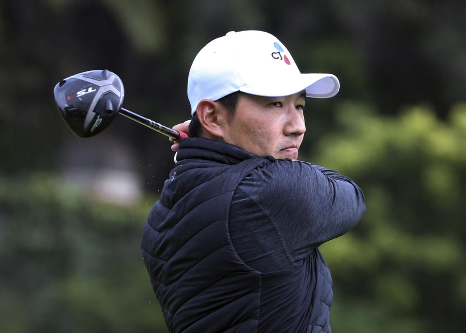 Sung Kang watches his drive on the second tee during the first round of the Genesis Open golf tournament at Riviera Country Club in the Pacific Palisades area of Los Angeles on Thursday, Feb. 14, 2019. (AP Photo/Reed Saxon)